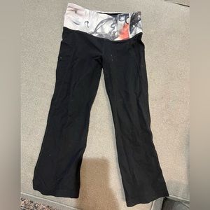 Lululemon cropped leggings with slit on back of calf.